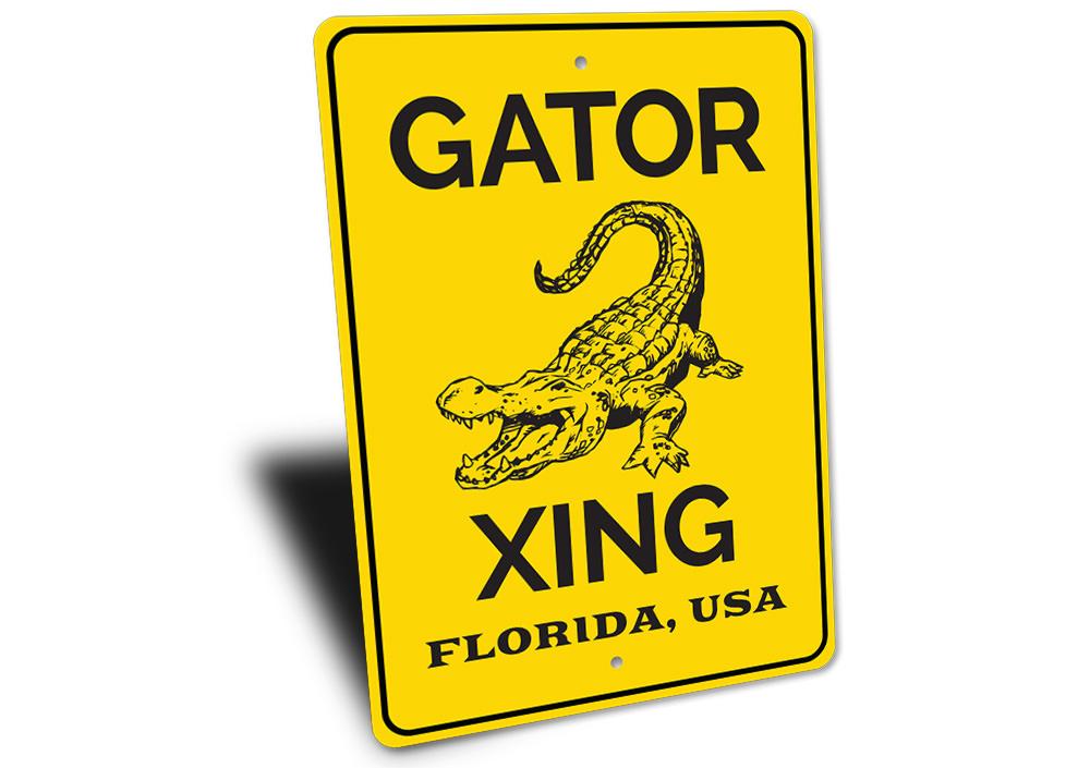 Gator Crossing Sign made of durable aluminum, featuring a playful design perfect for beach houses and coastal decor.