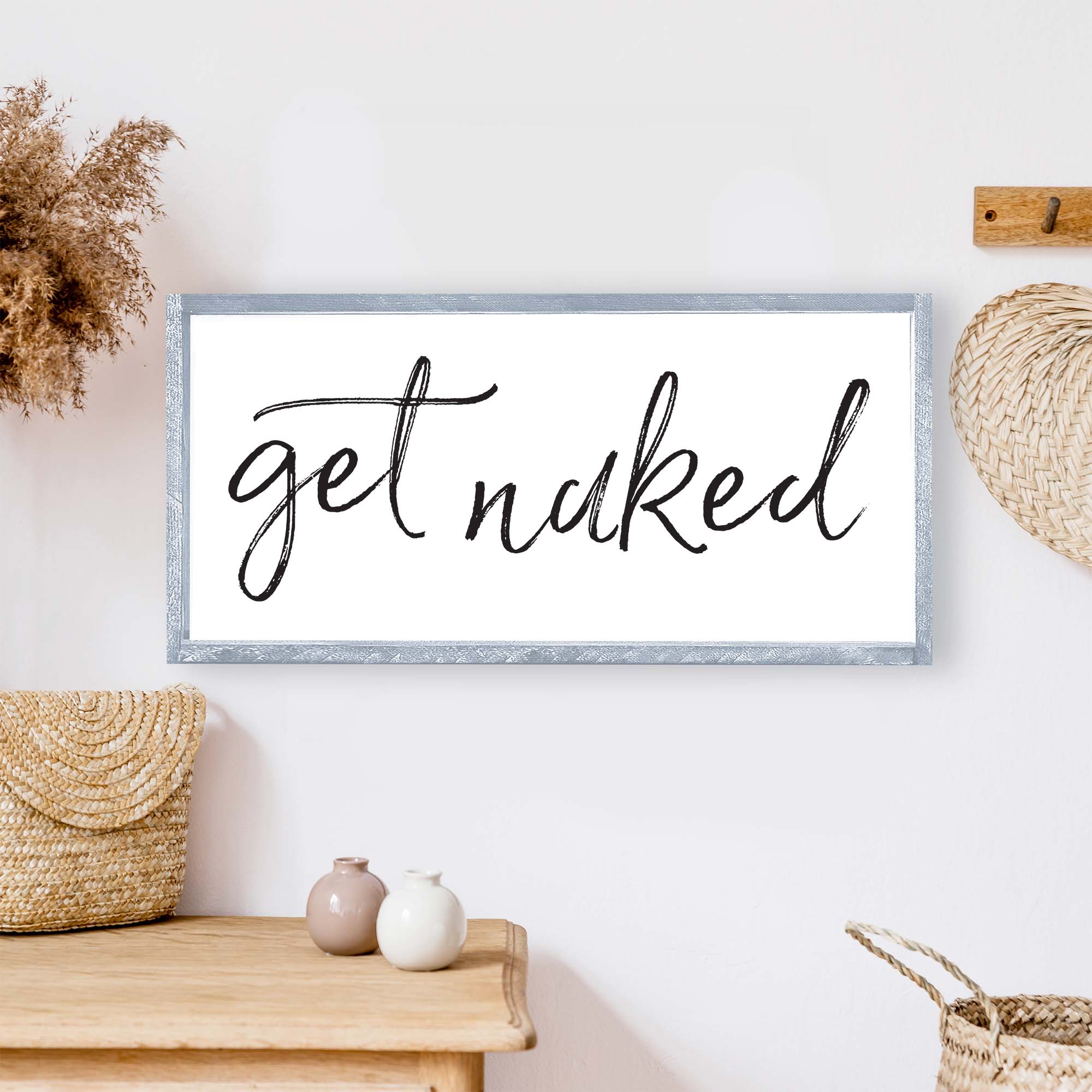 Get Naked Wood Sign with a rustic wood frame, black waterproof text on a white background, handmade in Toronto.