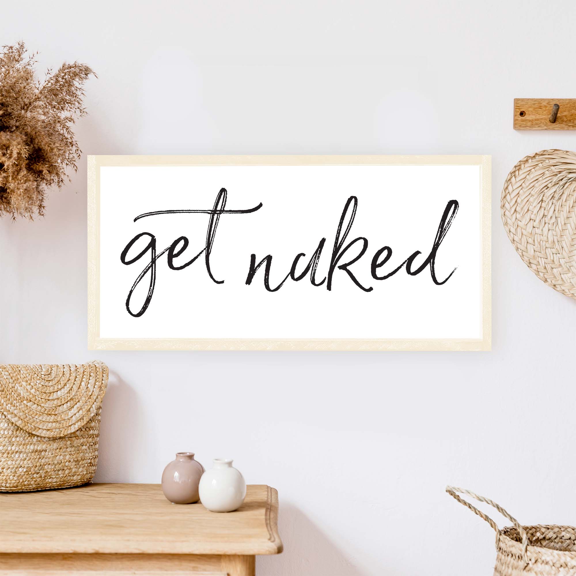 Get Naked Wood Sign with a rustic wood frame, black waterproof text on a white background, handmade in Toronto.