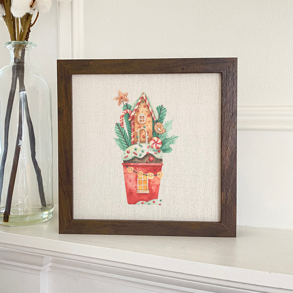 Gingerbread House Cupcake framed sign with a wood frame and linen-look background, perfect for holiday decor.