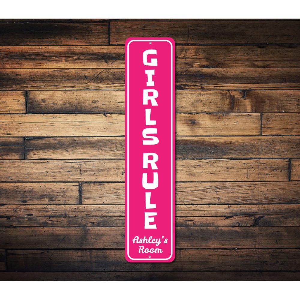 Girls Rule Vertical Sign made of high-quality aluminum, featuring vibrant colors and a fun design, perfect for kids' room decor.