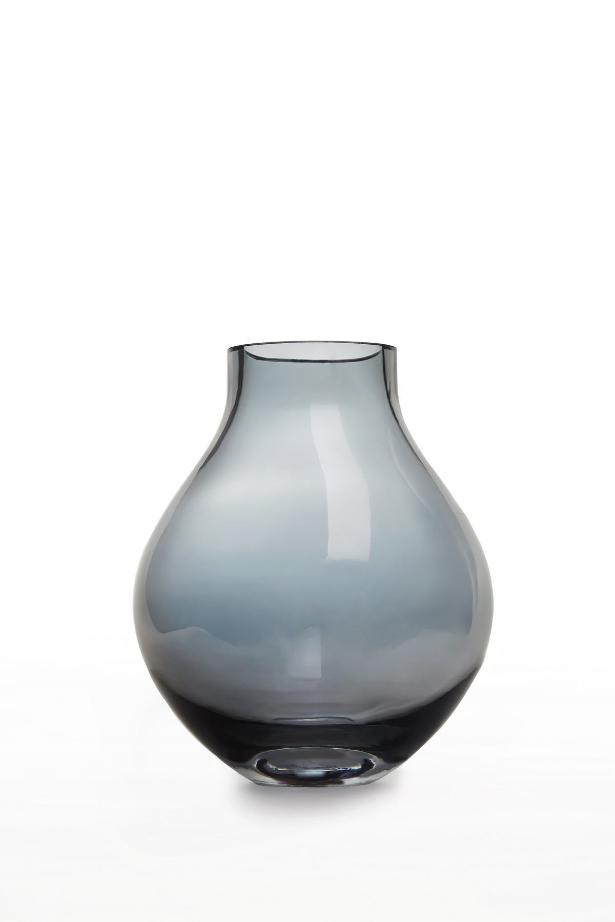 Bulb-shaped glass vase in subtle indigo light blue, showcasing elegant curves and thick glass design.