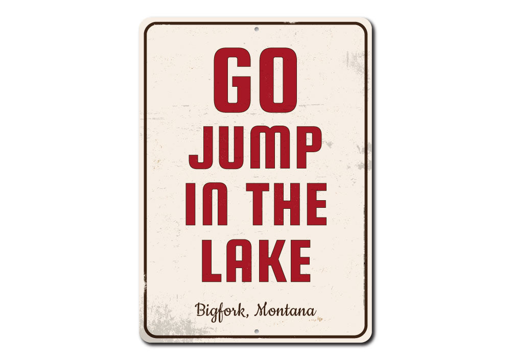 A decorative Go Jump in the Lake sign made of high-quality aluminum, featuring vibrant colors and customizable text, perfect for lakehouse decor.