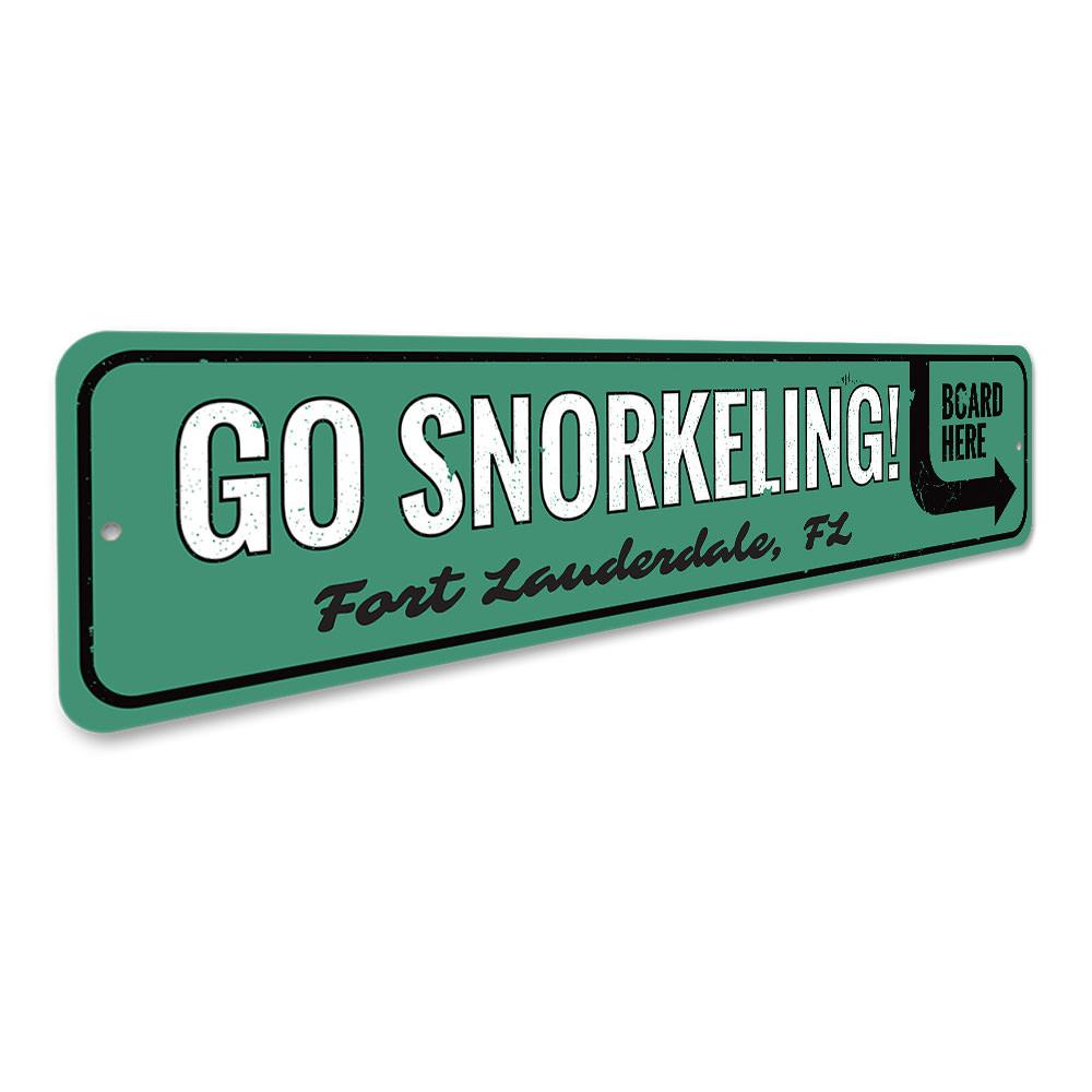 A vibrant Go Snorkeling Sign made of high-quality aluminum, featuring beach-themed graphics, perfect for coastal decor.