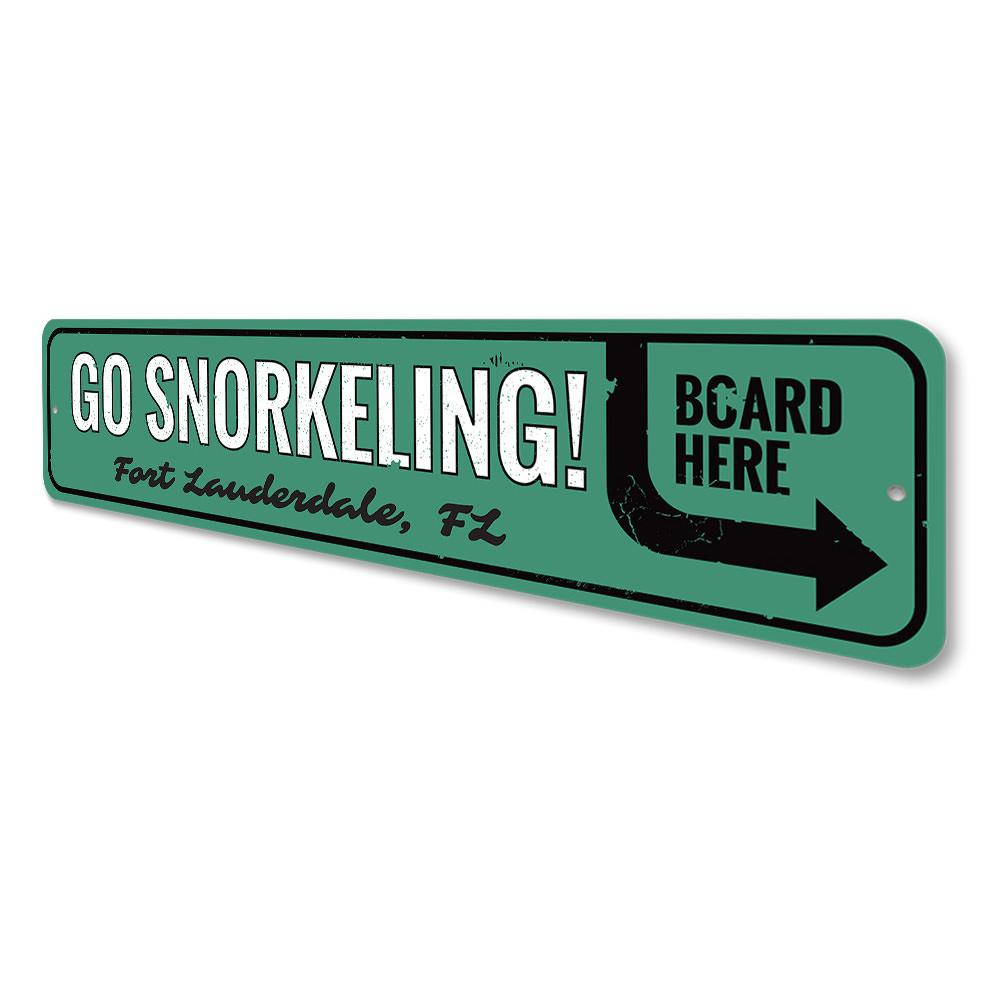 A vibrant Go Snorkeling Sign made of high-quality aluminum, featuring beach-themed graphics, perfect for coastal decor.