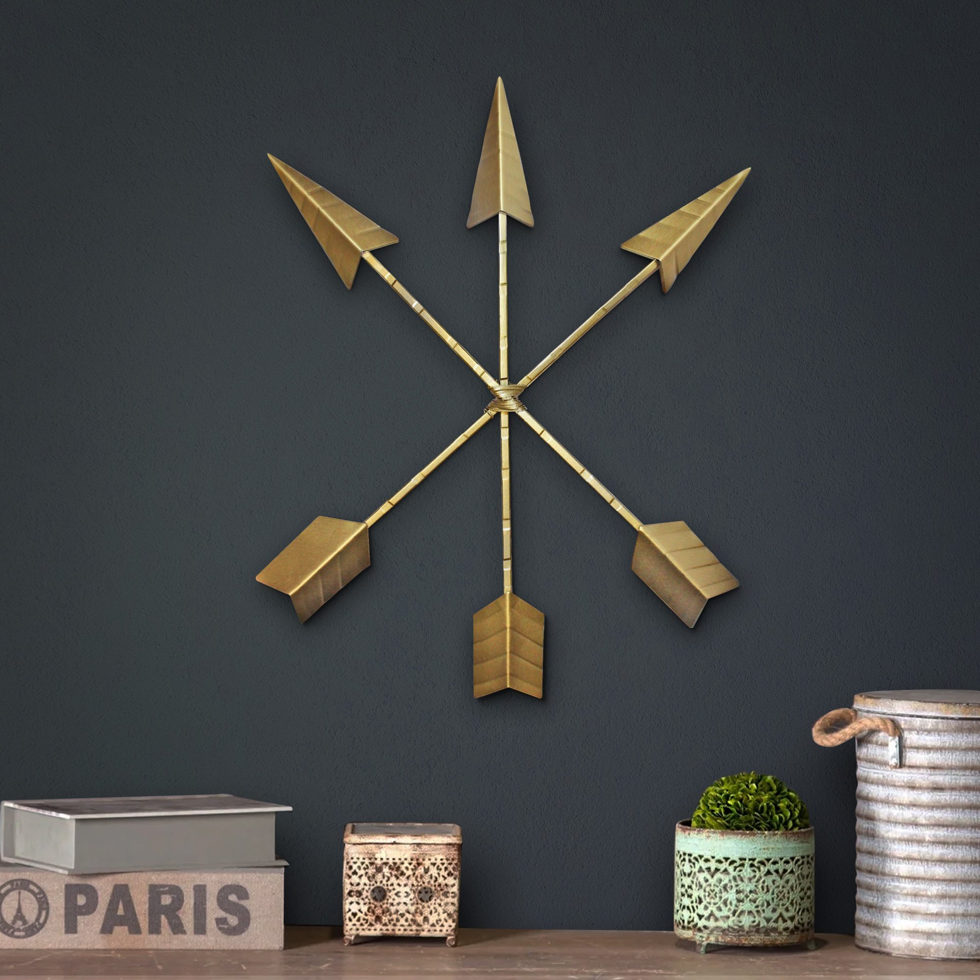 Three hand-painted gold arrows made of cast iron, each measuring 15 inches tall, arranged in a decorative display.