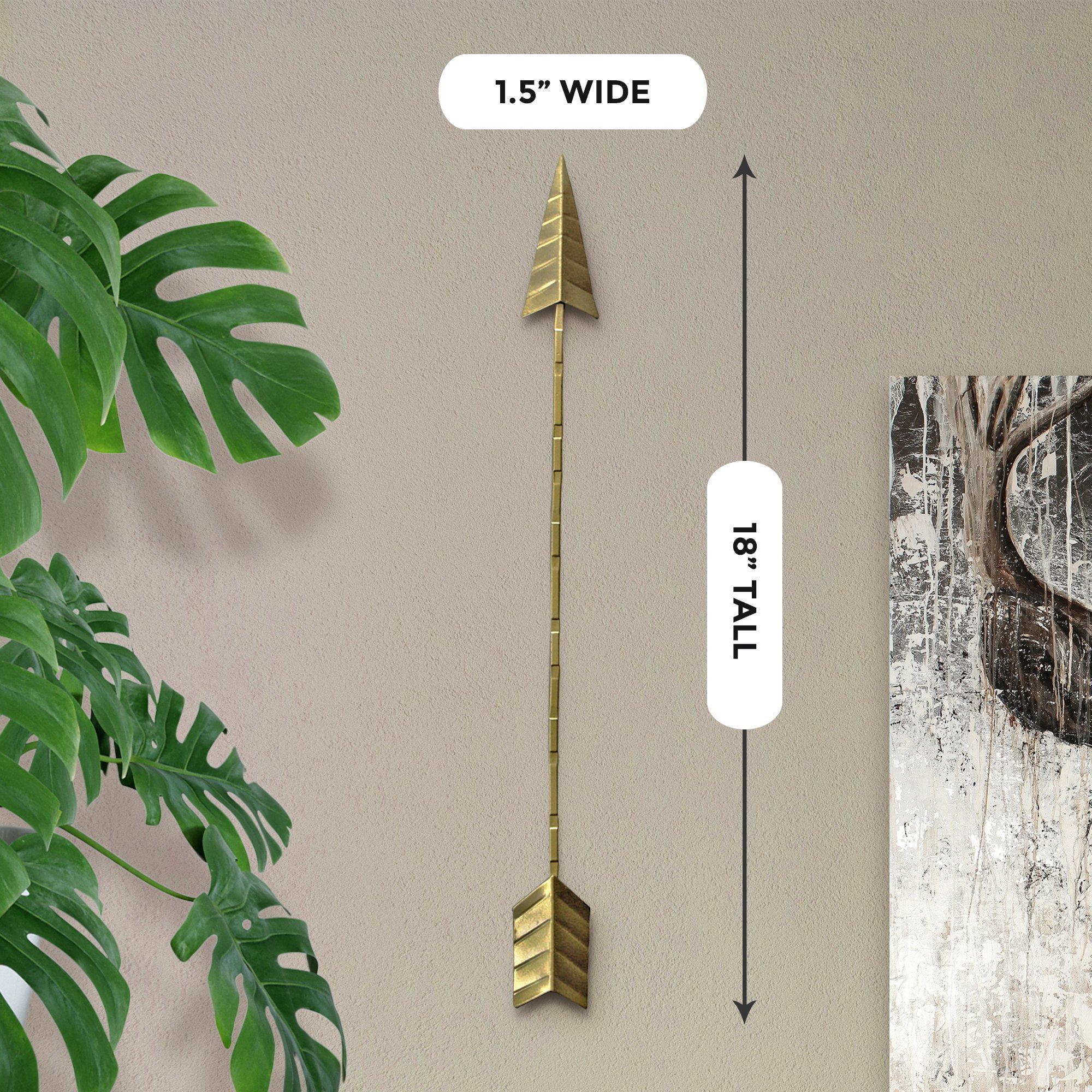 Handmade 18-inch gold cast iron arrow wall decor with dual hooks for versatile hanging.