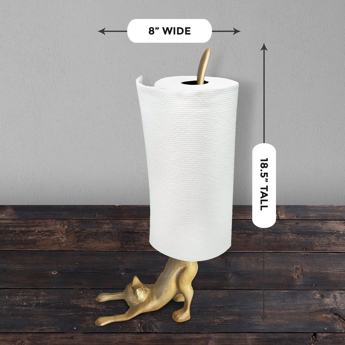 A whimsical gold cat paper towel holder made of cast iron, featuring a stretching cat design with a tail that holds paper towel rolls.