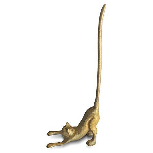 A whimsical gold cat paper towel holder made of cast iron, featuring a stretching cat design with a tail that holds paper towel rolls.