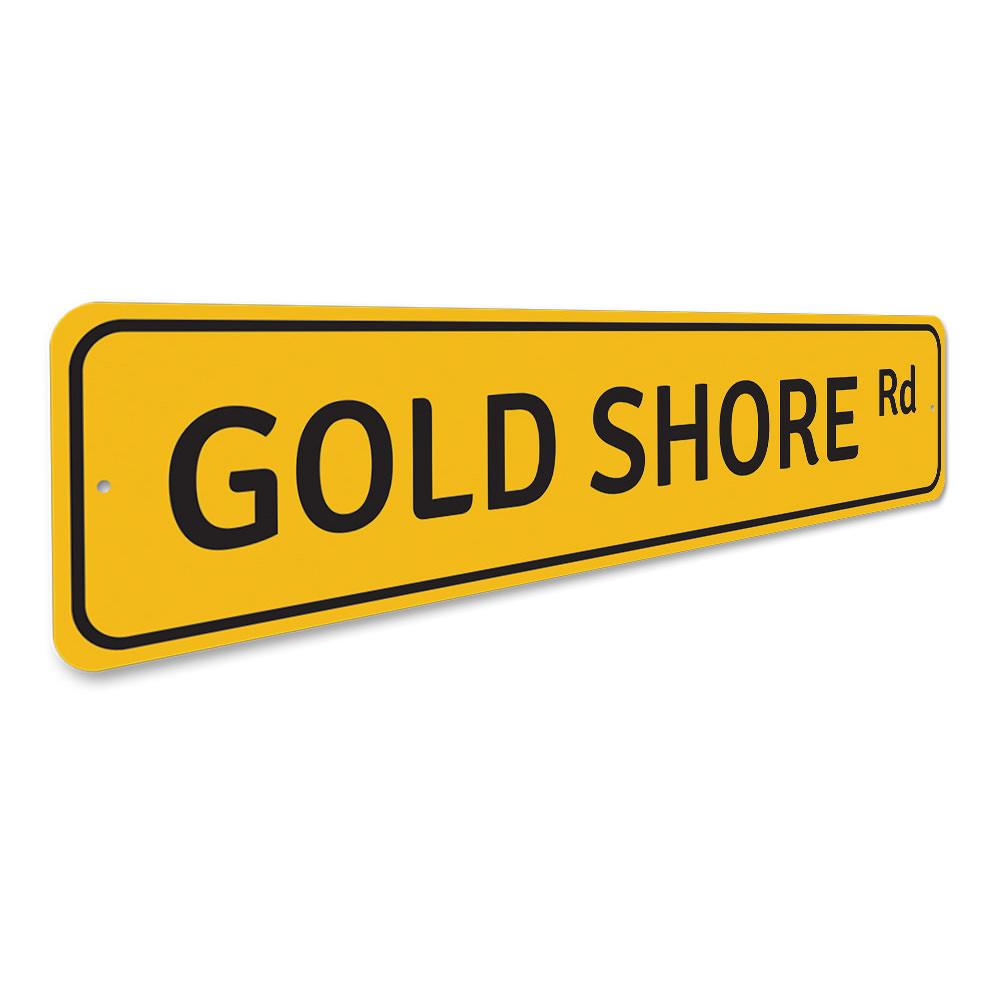 Gold Shore Road Sign made of durable aluminum, featuring a beach-themed design perfect for coastal decor.