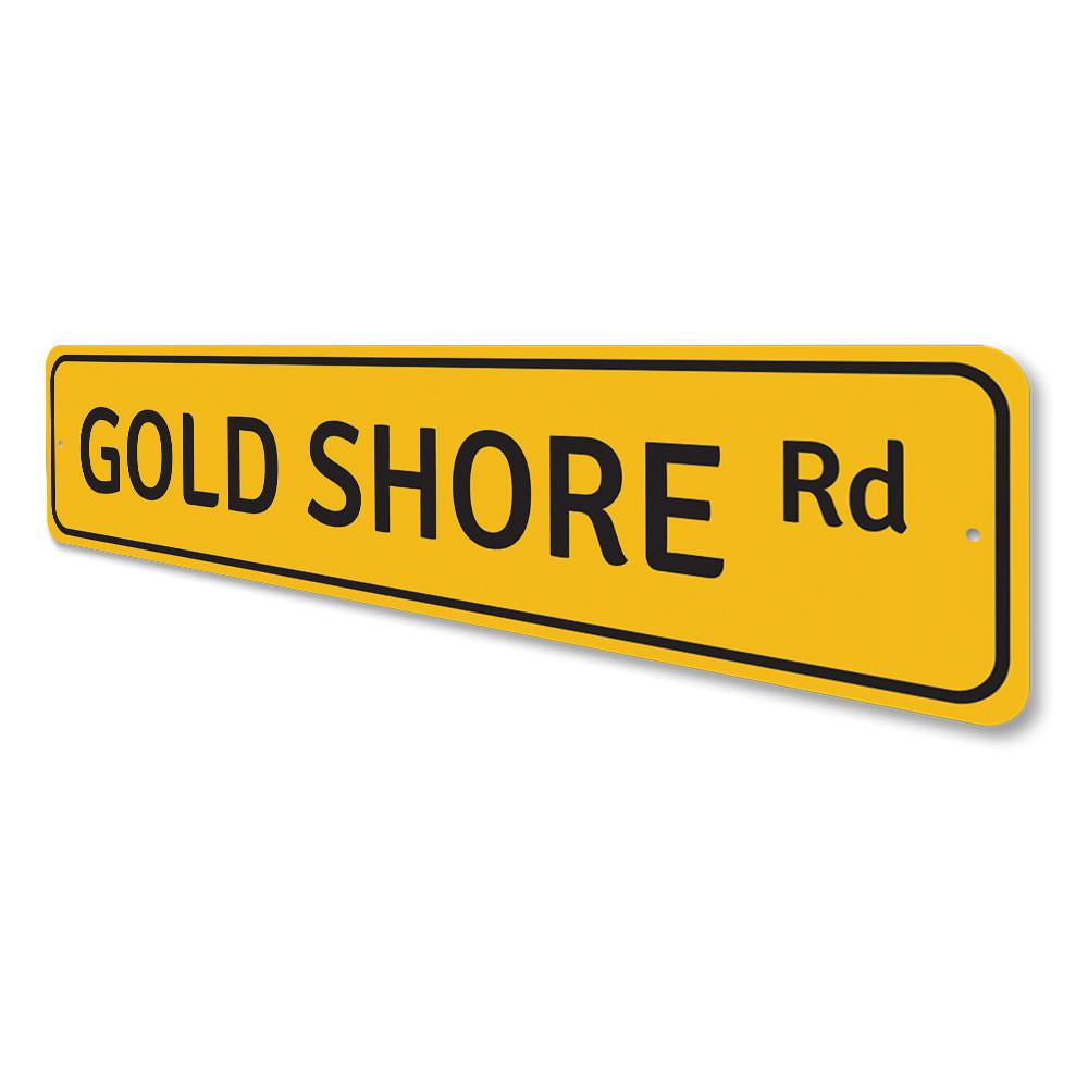 Gold Shore Road Sign made of durable aluminum, featuring a beach-themed design perfect for coastal decor.