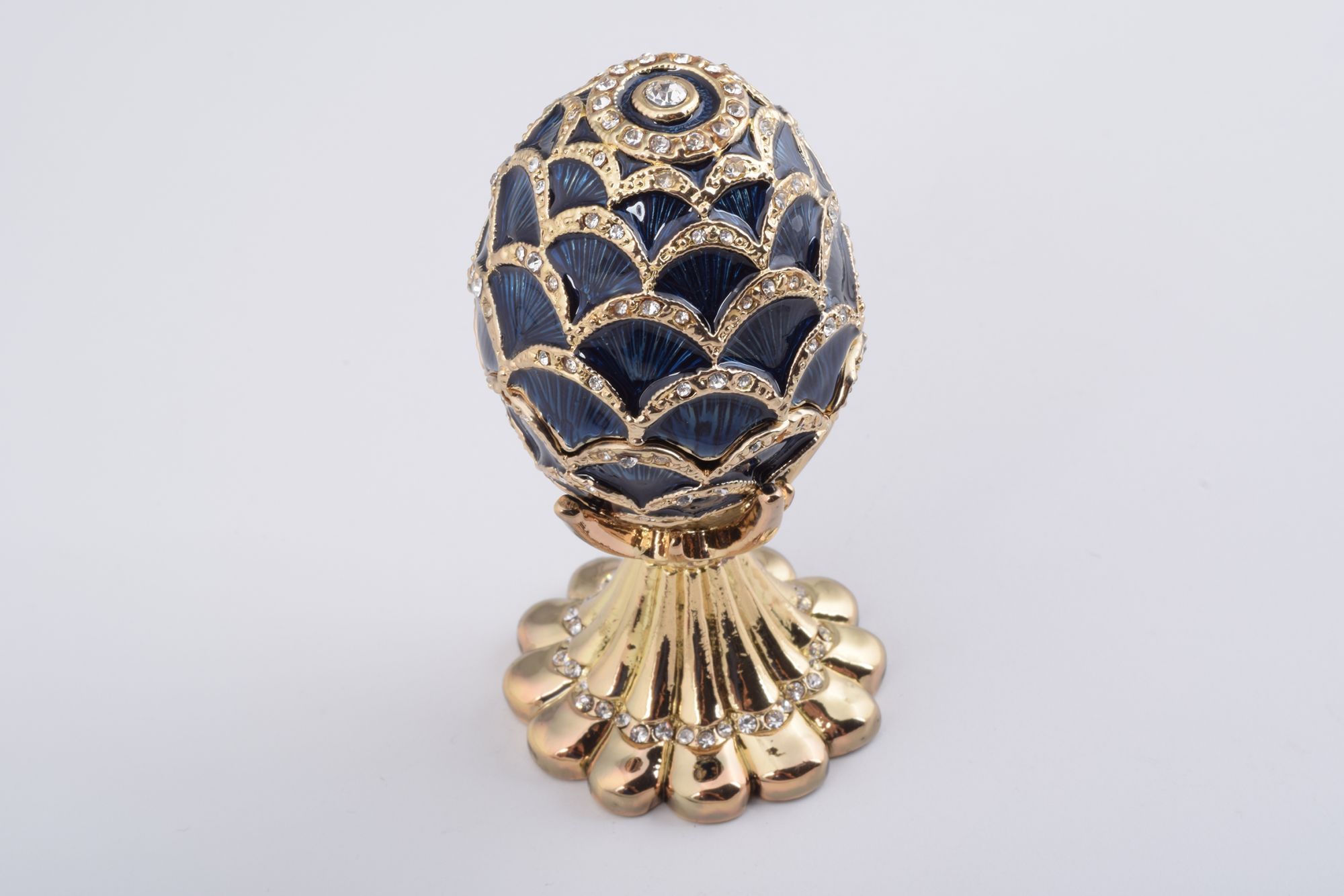 Golden Blue Pineapple Shape Faberge Egg trinket box adorned with Austrian crystals and 24K gold plating, showcasing exquisite craftsmanship.