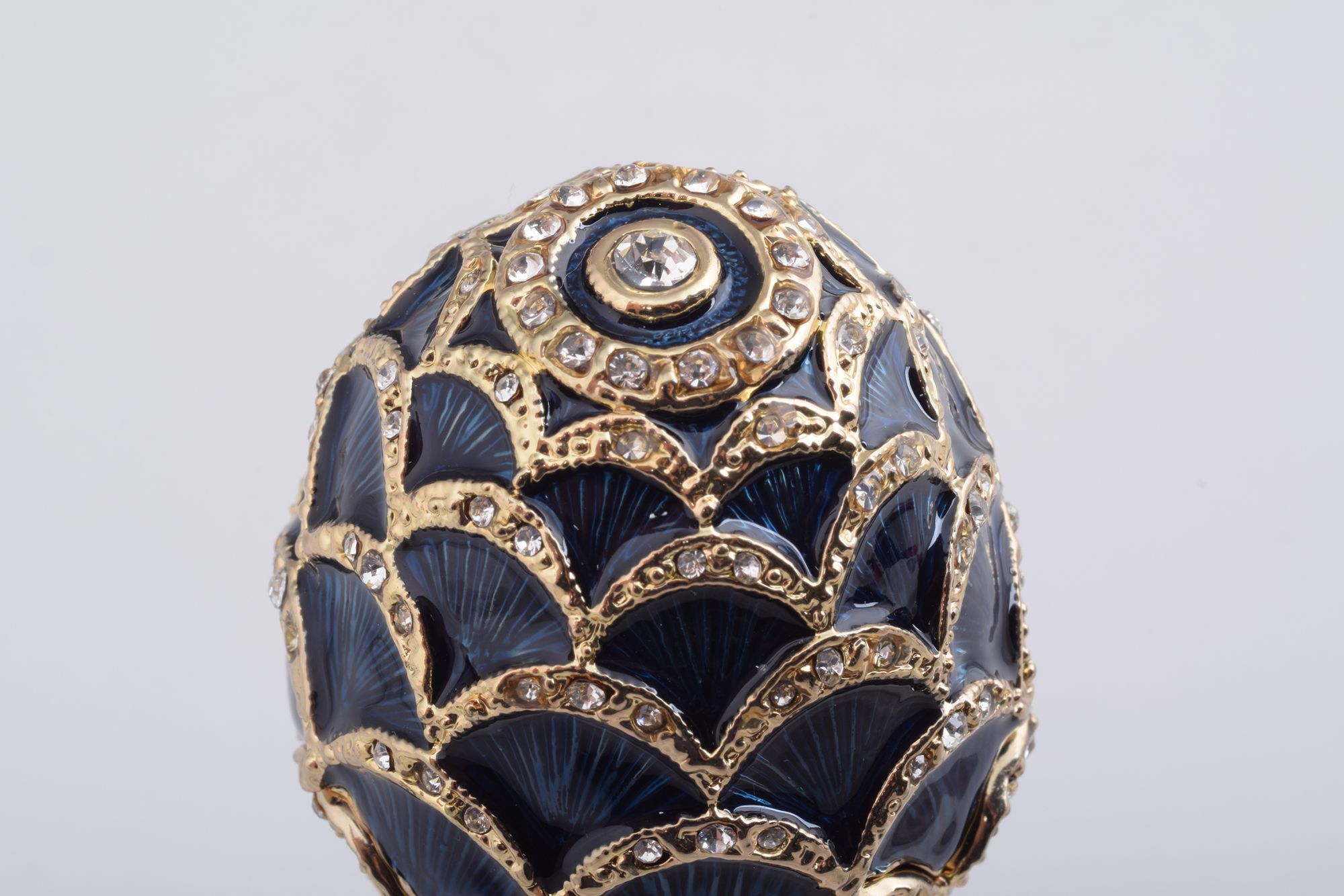 Golden Blue Pineapple Shape Faberge Egg trinket box adorned with Austrian crystals and 24K gold plating, showcasing exquisite craftsmanship.