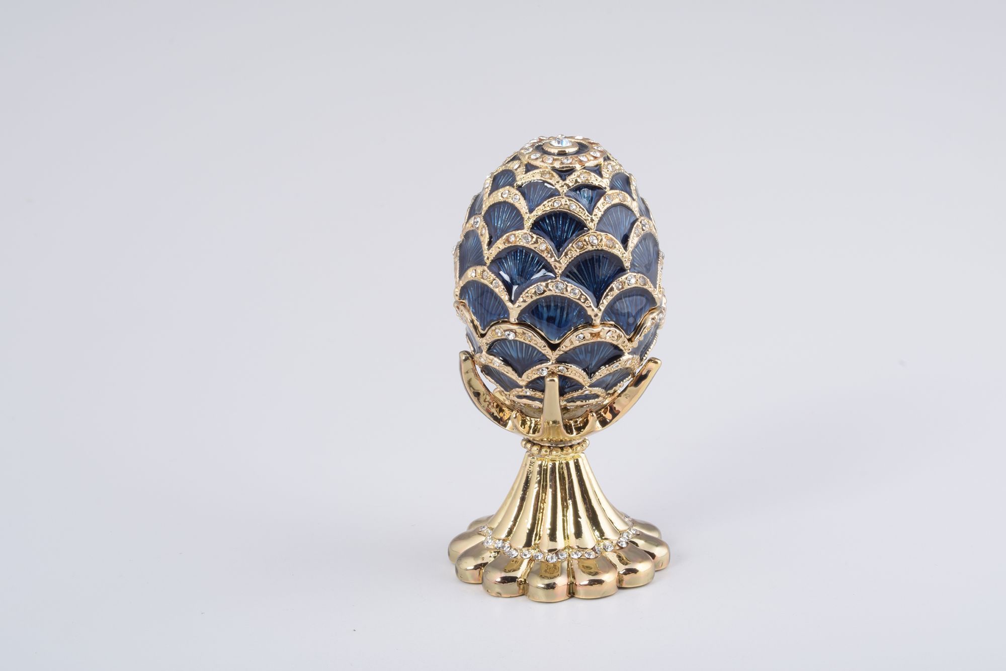 Golden Blue Pineapple Shape Faberge Egg trinket box adorned with Austrian crystals and 24K gold plating, showcasing exquisite craftsmanship.