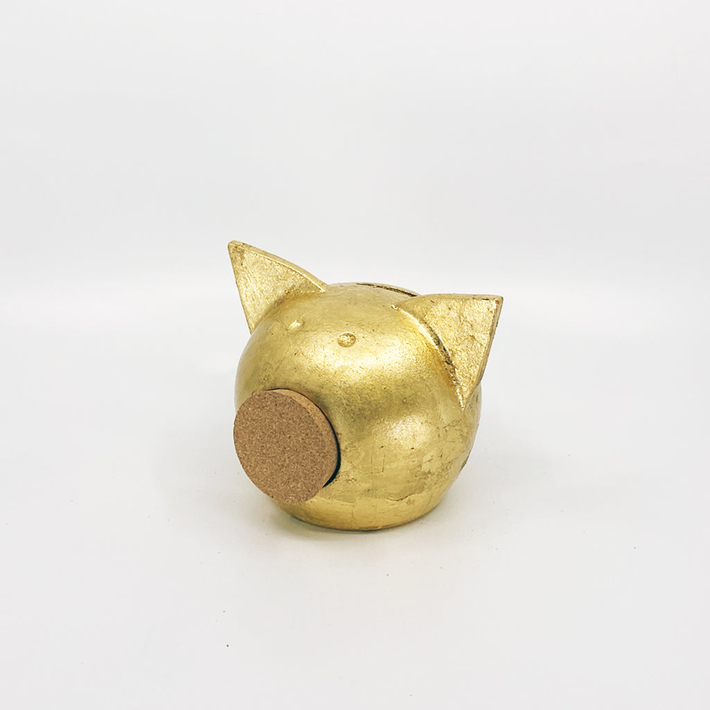 A luxurious golden piggybank from the Golden Collection, symbolizing luck and prosperity, crafted with premium golden foil.