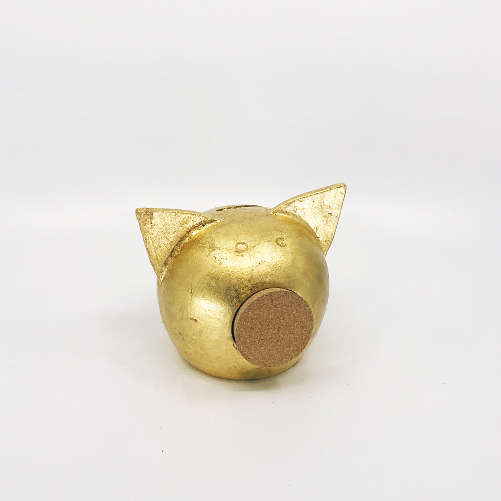 A luxurious golden piggybank from the Golden Collection, symbolizing luck and prosperity, crafted with premium golden foil.