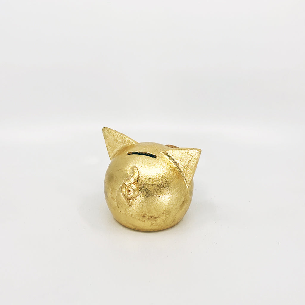 A luxurious golden piggybank from the Golden Collection, symbolizing luck and prosperity, crafted with premium golden foil.