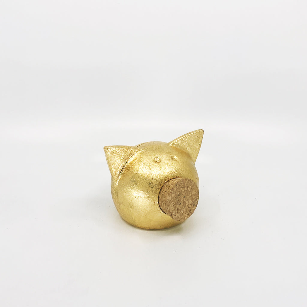 A luxurious golden piggybank from the Golden Collection, symbolizing luck and prosperity, crafted with premium golden foil.