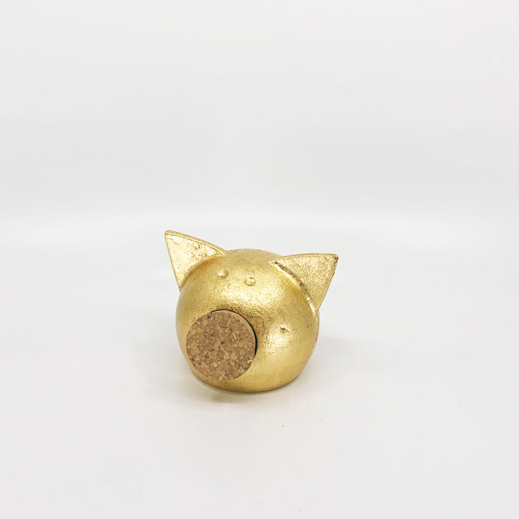 A luxurious golden piggybank from the Golden Collection, symbolizing luck and prosperity, crafted with premium golden foil.