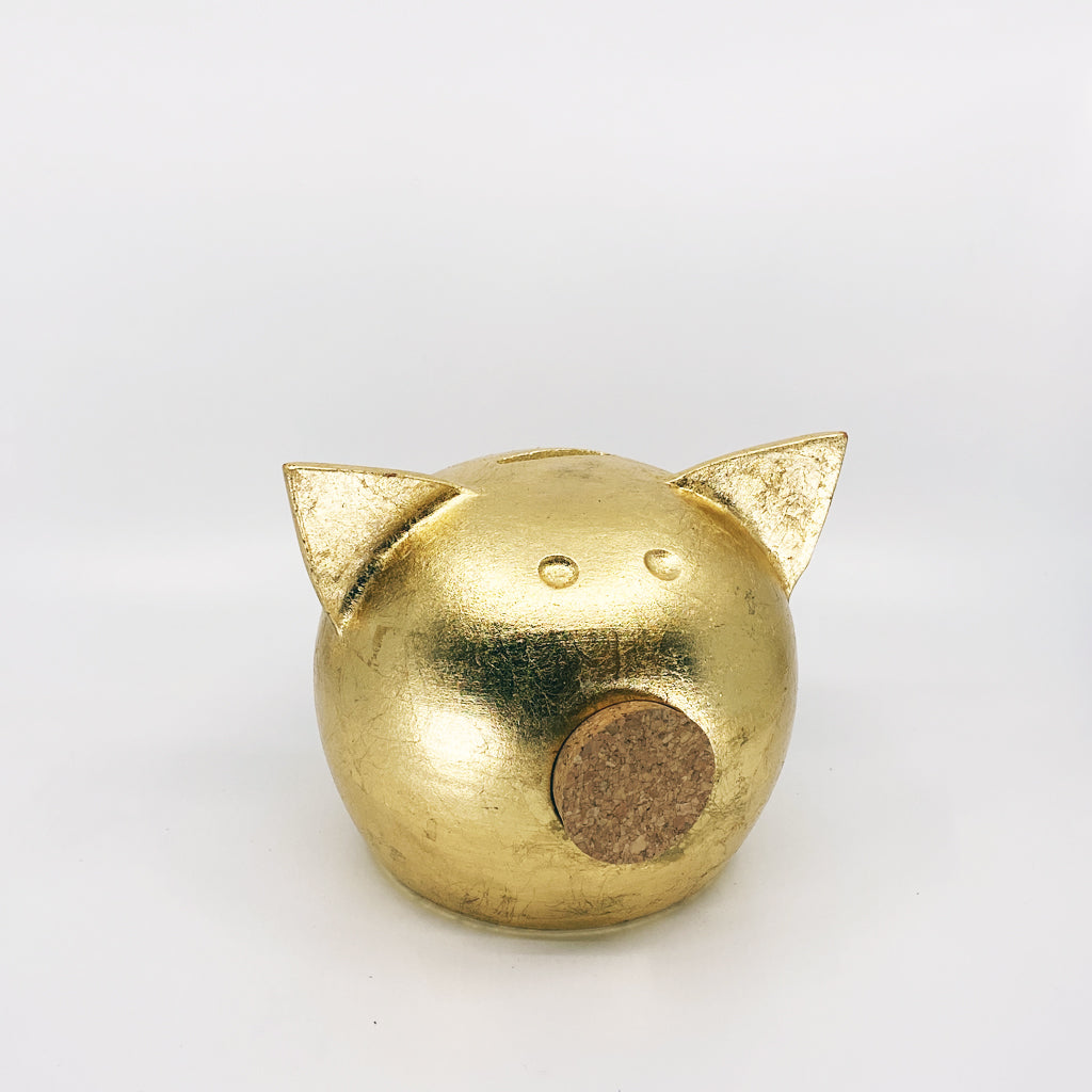 A luxurious golden piggybank from the Golden Collection, symbolizing luck and prosperity, crafted with premium golden foil.