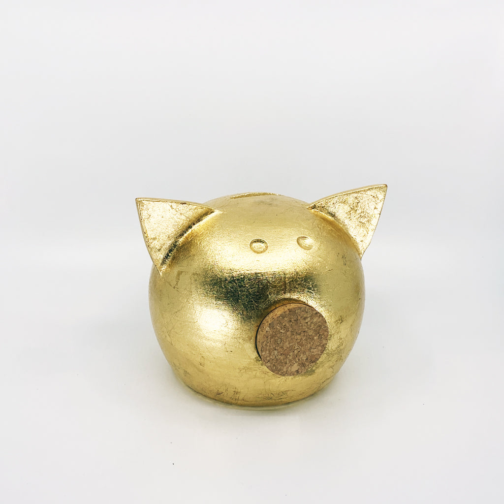 A luxurious golden piggybank from the Golden Collection, symbolizing luck and prosperity, crafted with premium golden foil.