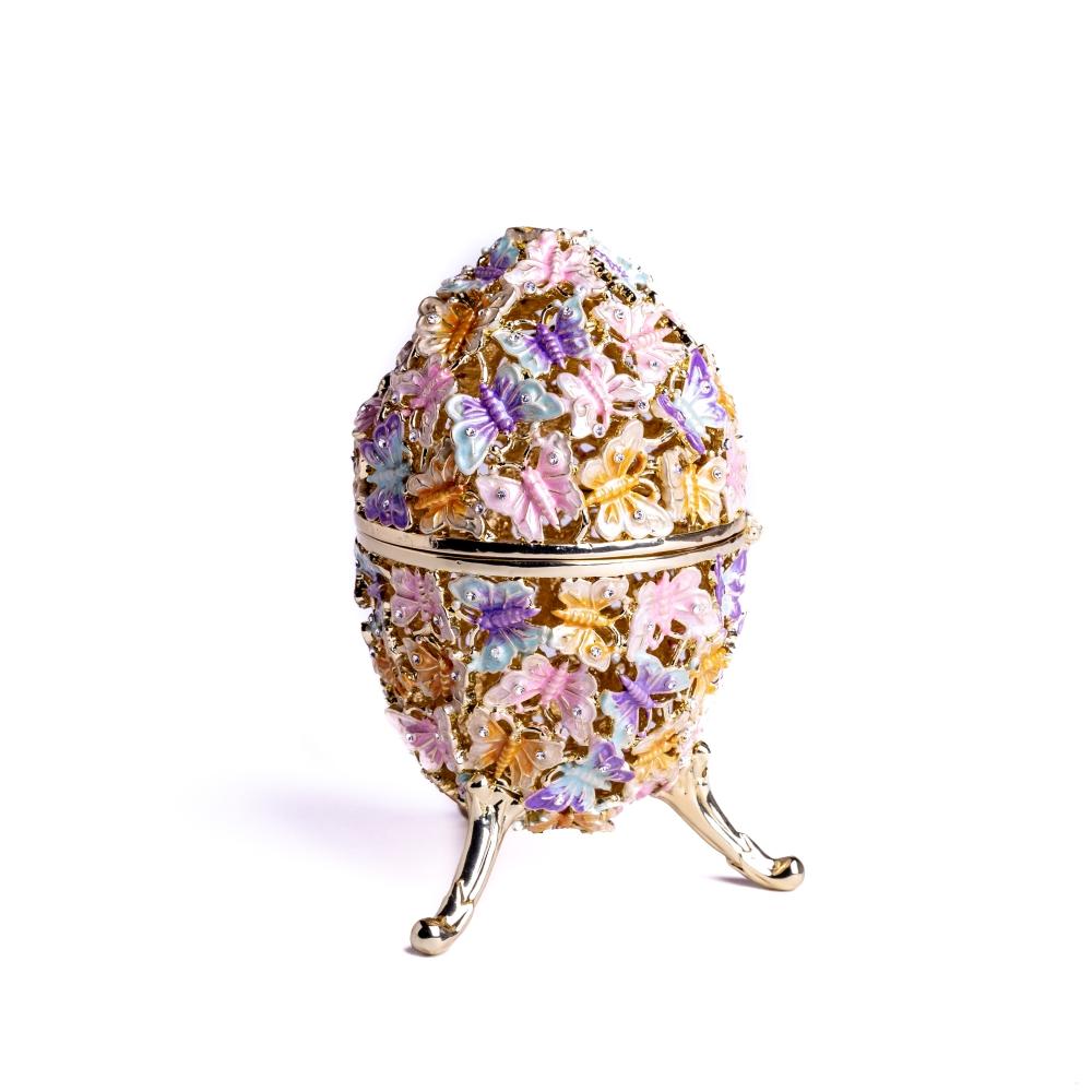 Golden Faberge Egg trinket box decorated with colorful butterflies and sparkling Austrian crystals, showcasing intricate craftsmanship.