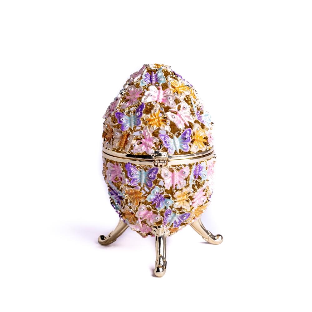 Golden Faberge Egg trinket box decorated with colorful butterflies and sparkling Austrian crystals, showcasing intricate craftsmanship.