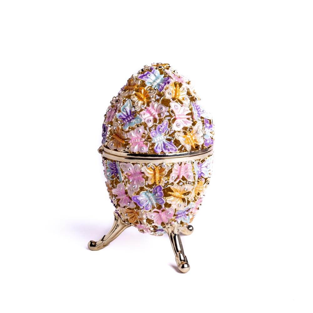 Golden Faberge Egg trinket box decorated with colorful butterflies and sparkling Austrian crystals, showcasing intricate craftsmanship.