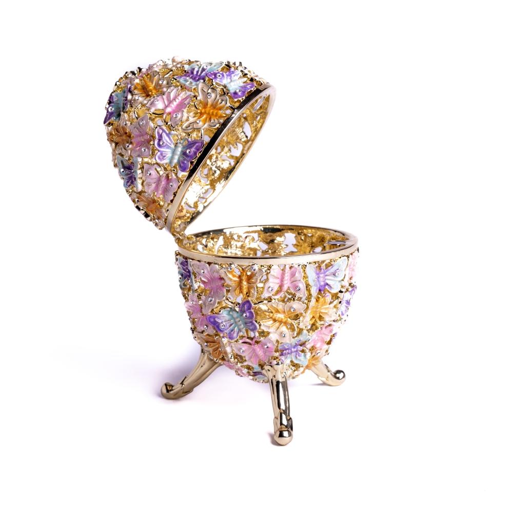 Golden Faberge Egg trinket box decorated with colorful butterflies and sparkling Austrian crystals, showcasing intricate craftsmanship.