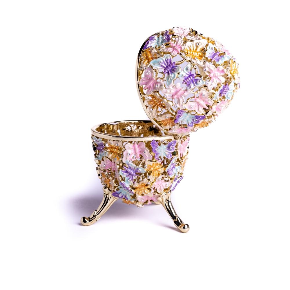 Golden Faberge Egg trinket box decorated with colorful butterflies and sparkling Austrian crystals, showcasing intricate craftsmanship.