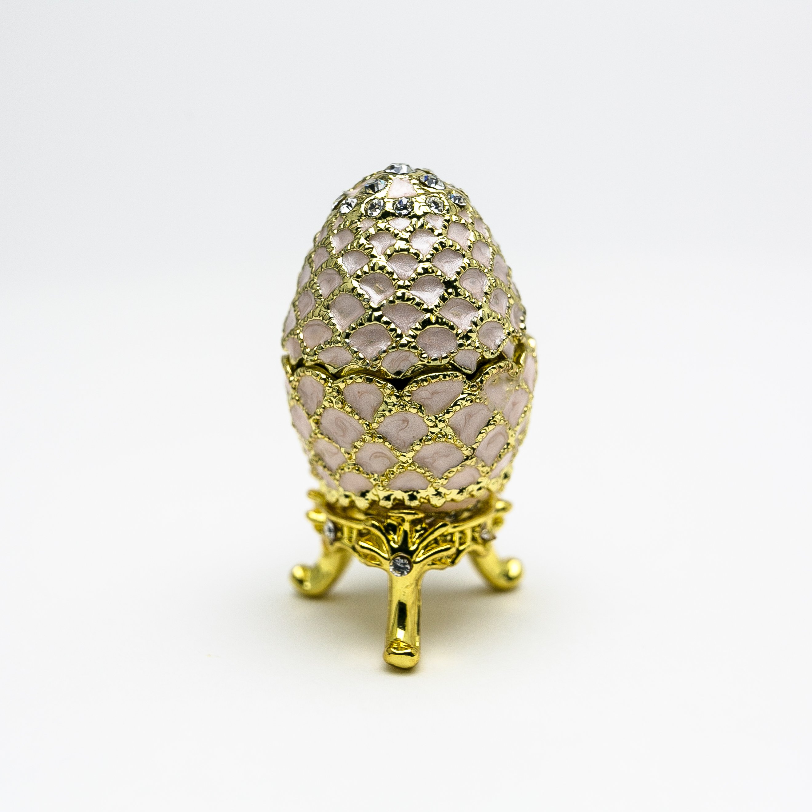 Golden Pink Faberge Egg trinket box with Austrian crystals and 24K gold plating, showcasing intricate enamel painting.