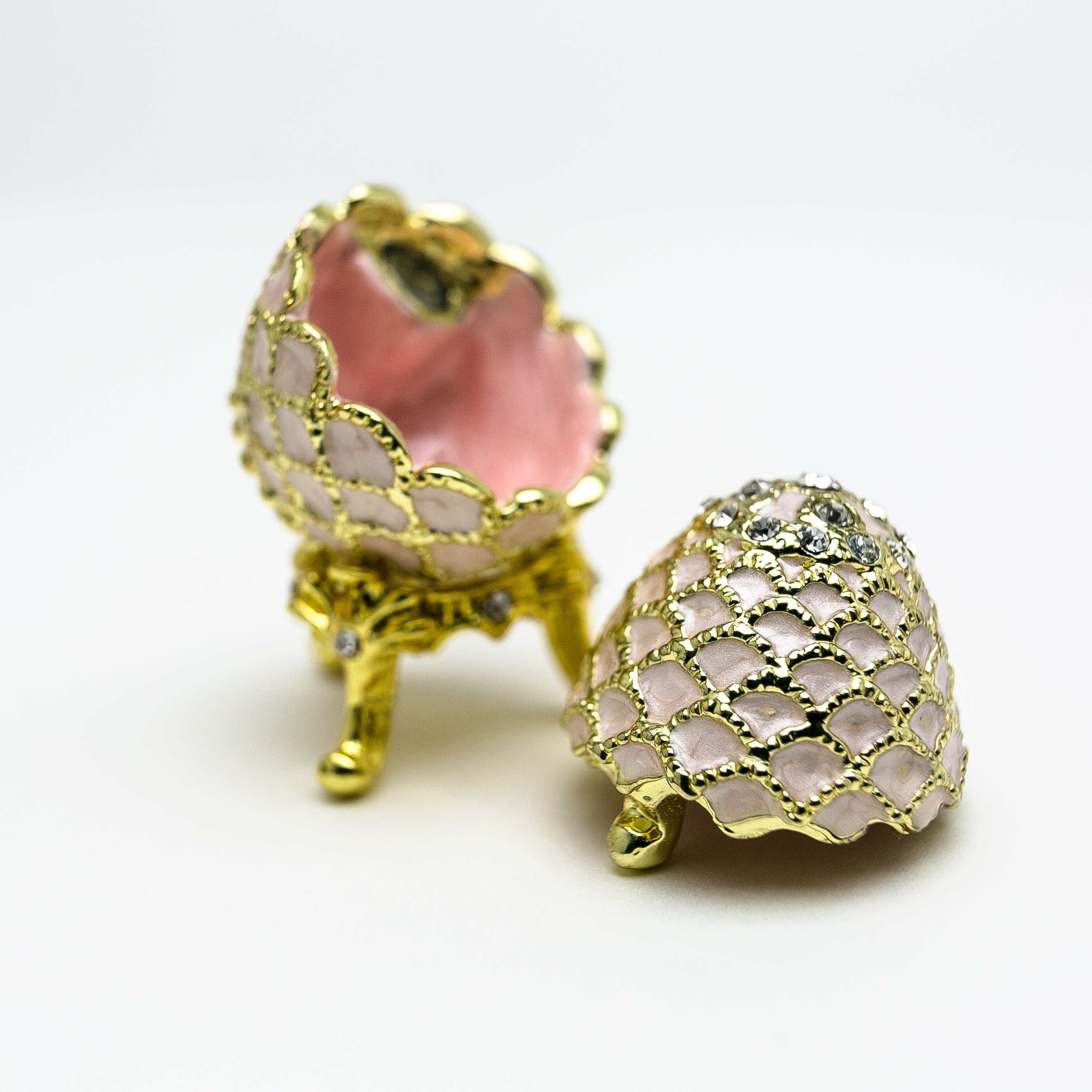 Golden Pink Faberge Egg trinket box with Austrian crystals and 24K gold plating, showcasing intricate enamel painting.