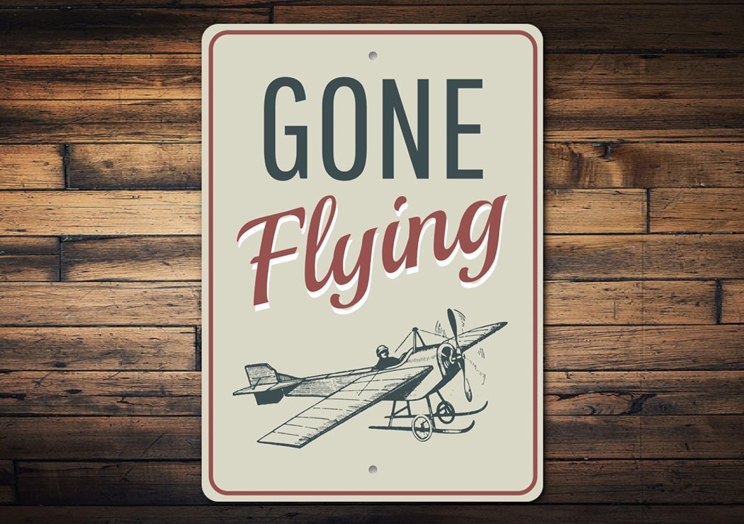 Gone Flying Aviation Sign made of durable aluminum, featuring an aviation theme, perfect for home decor.