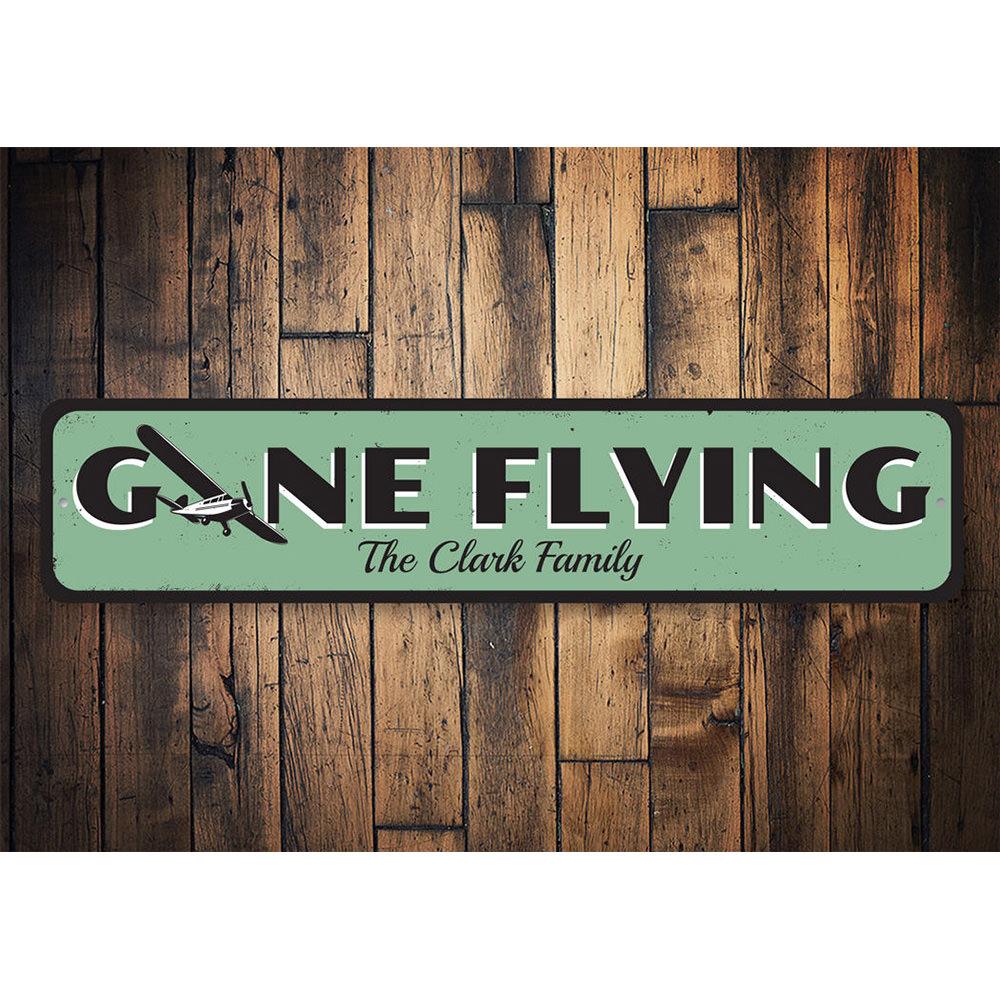 Gone Flying Sign made of high-quality aluminum, featuring customizable text and pre-drilled holes for easy mounting.