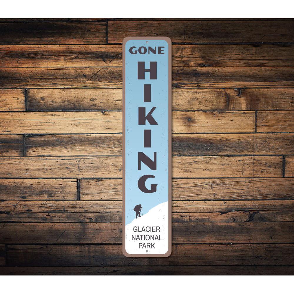 Gone Hiking Vertical Sign made of durable aluminum, featuring a nature-inspired design perfect for lakehouses.