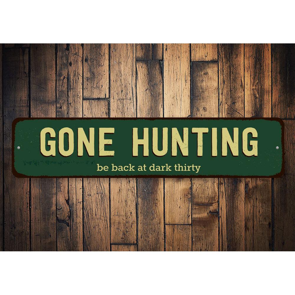 Gone Hunting Sign made of high-quality aluminum, featuring a rustic design perfect for home decor.