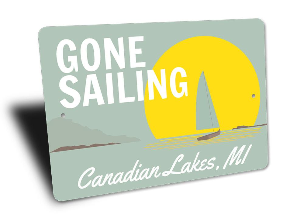 Gone Sailing Sign made of durable aluminum, featuring nautical-themed design, perfect for lakehouse decor.