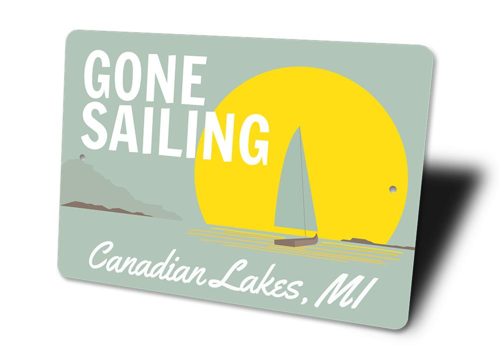 Gone Sailing Sign made of durable aluminum, featuring nautical-themed design, perfect for lakehouse decor.