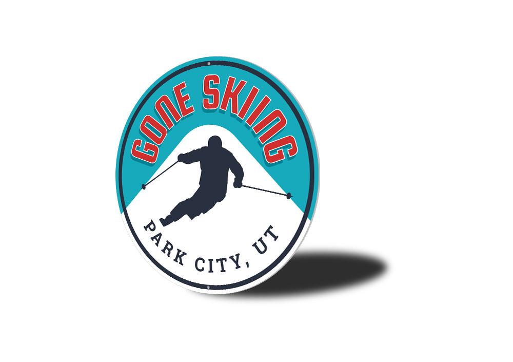 Gone Skiing Circle Sign made of high-quality aluminum, featuring a ski-themed design perfect for lodge decor.