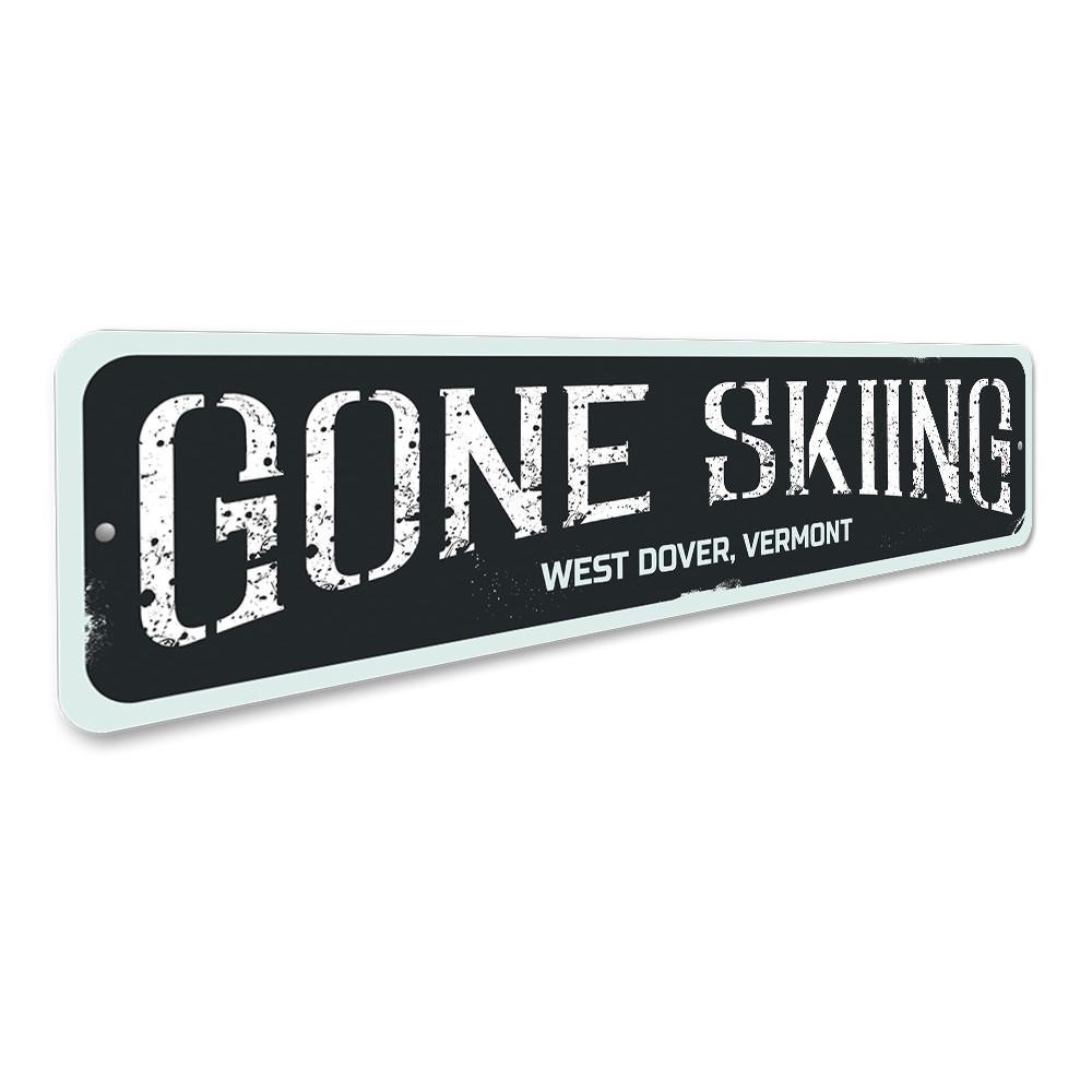 Gone Skiing Sign made of high-quality aluminum, featuring a ski-themed design, perfect for home decor.