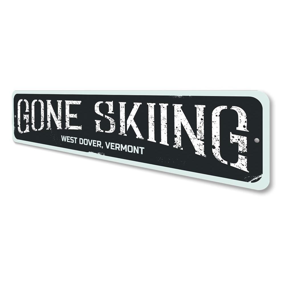 Gone Skiing Sign made of high-quality aluminum, featuring a ski-themed design, perfect for home decor.