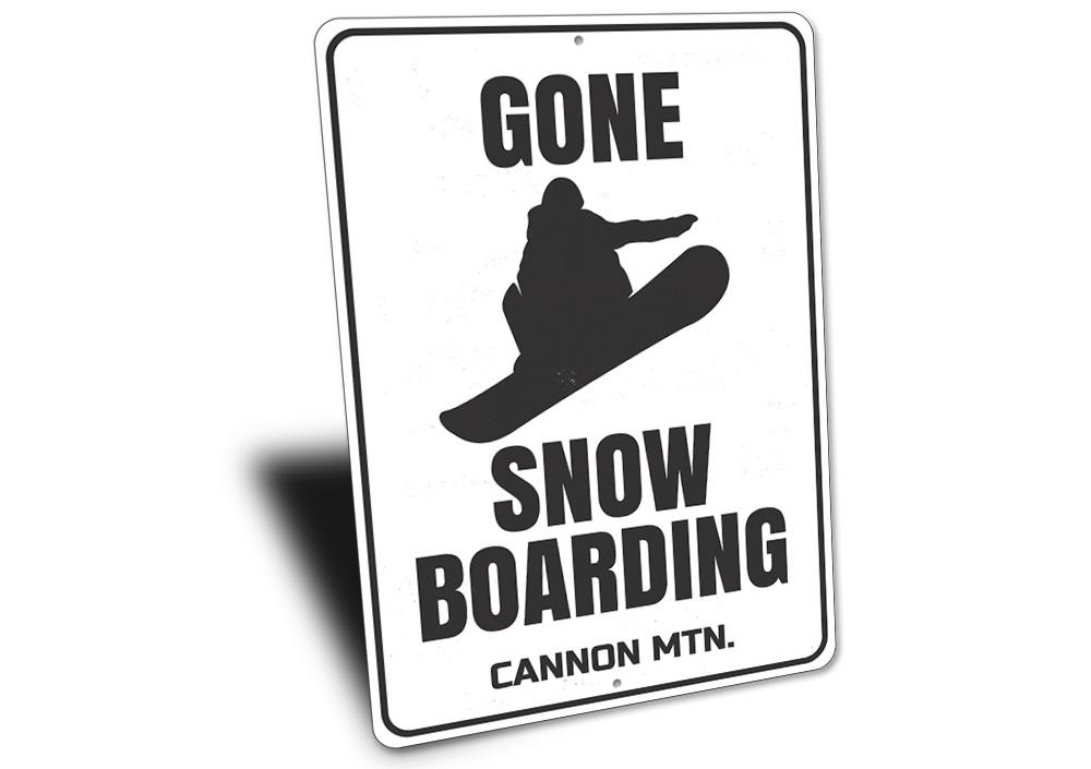 Gone Snowboarding decorative sign made of aluminum, featuring a stylish design perfect for snowboarding enthusiasts.