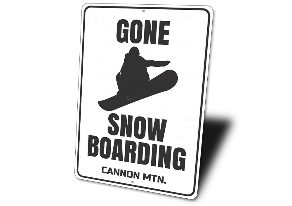 Gone Snowboarding decorative sign made of aluminum, featuring a stylish design perfect for snowboarding enthusiasts.