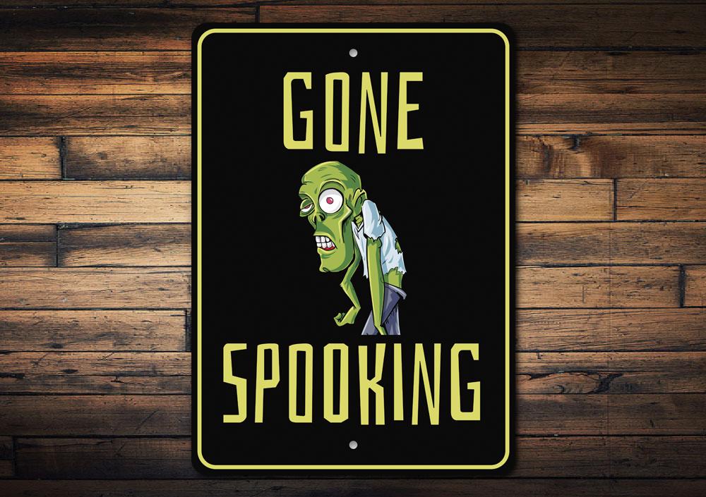 Gone Spooking Sign featuring spooky Halloween design, made from high-quality aluminum with pre-drilled holes for easy mounting.