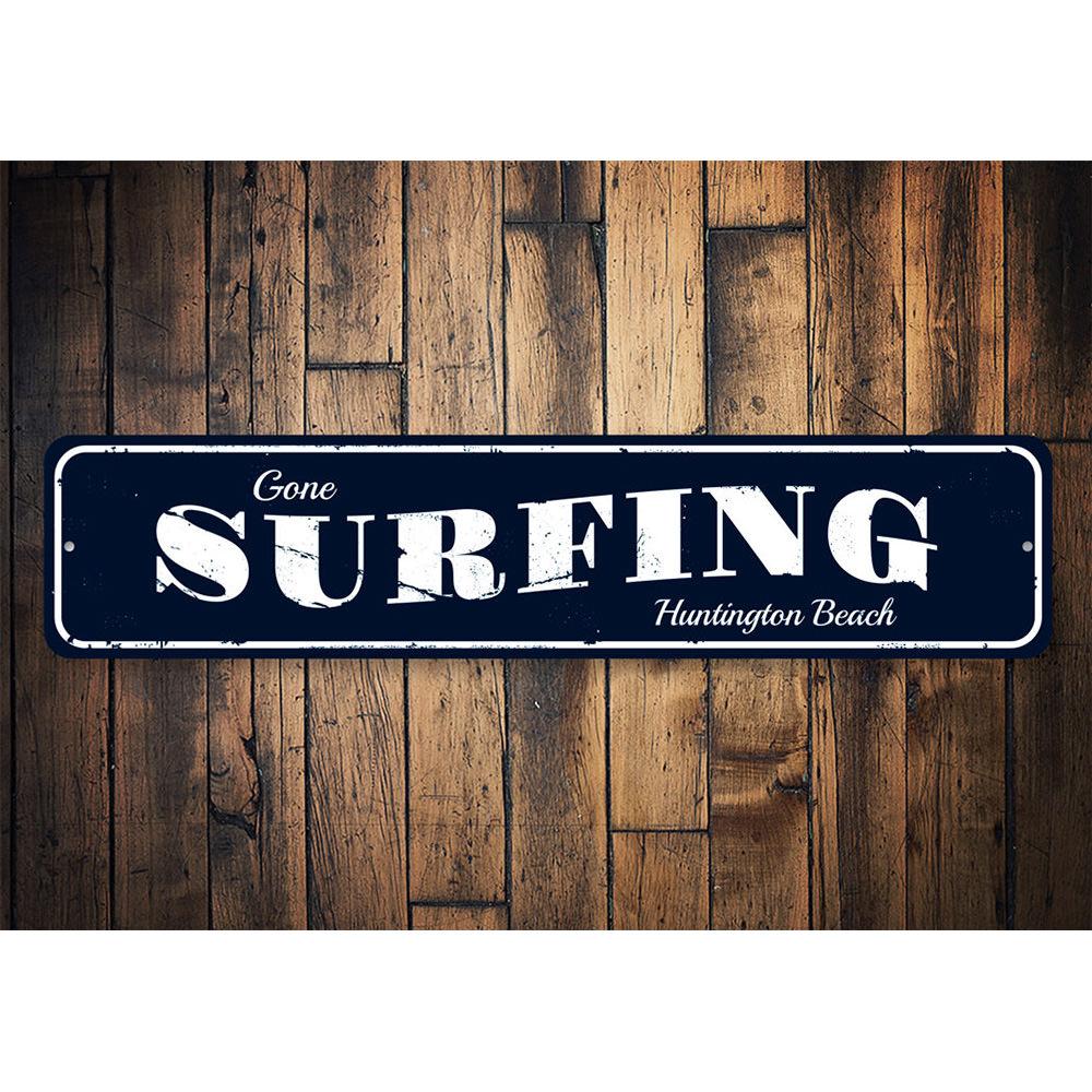 Gone Surfing Beach Sign made of high-quality aluminum, featuring a vibrant design perfect for coastal decor.