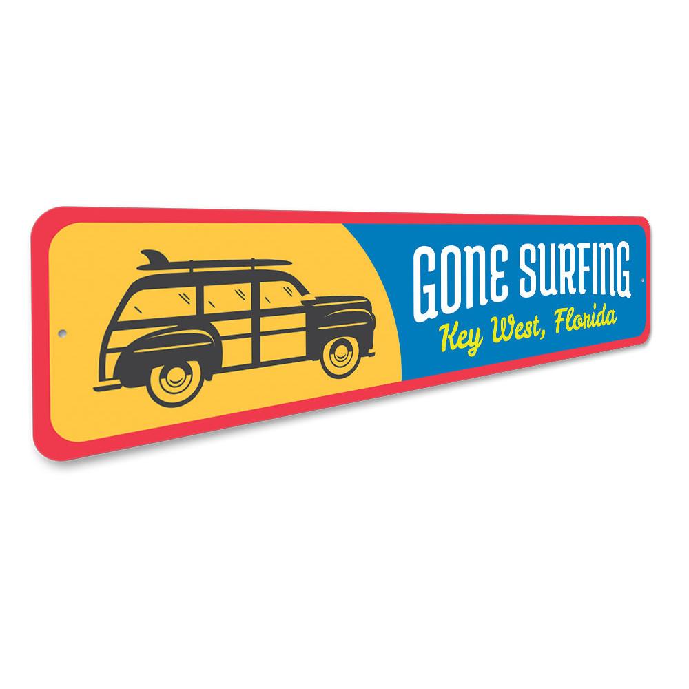 Gone Surfing Key West Sign made of high-quality aluminum, featuring vibrant colors and a beach-themed design, perfect for coastal decor.