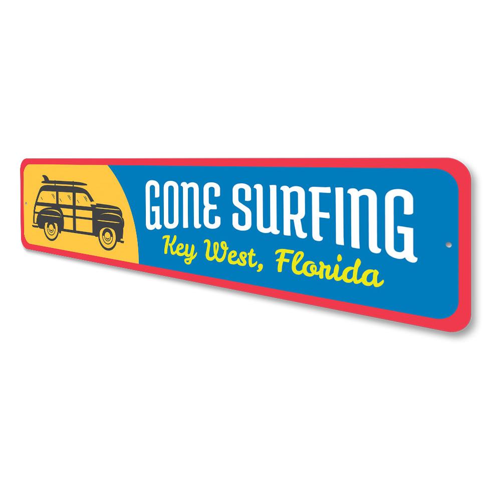 Gone Surfing Key West Sign made of high-quality aluminum, featuring vibrant colors and a beach-themed design, perfect for coastal decor.