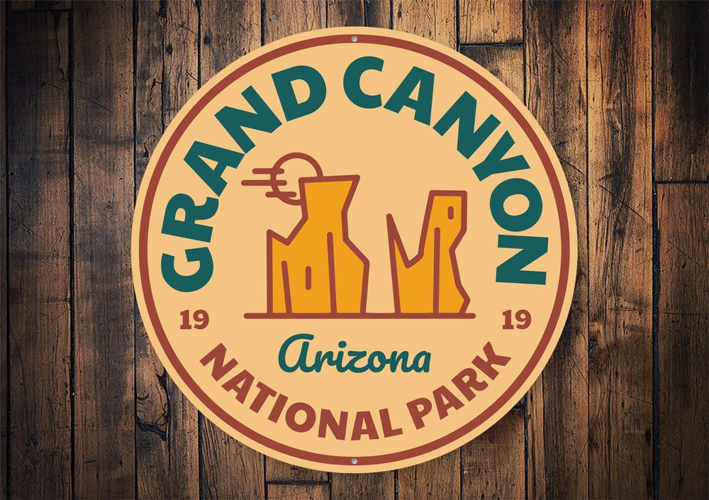 A decorative Grand Canyon Travel Sign made of aluminum, featuring vibrant colors and a scenic design, perfect for home decor.