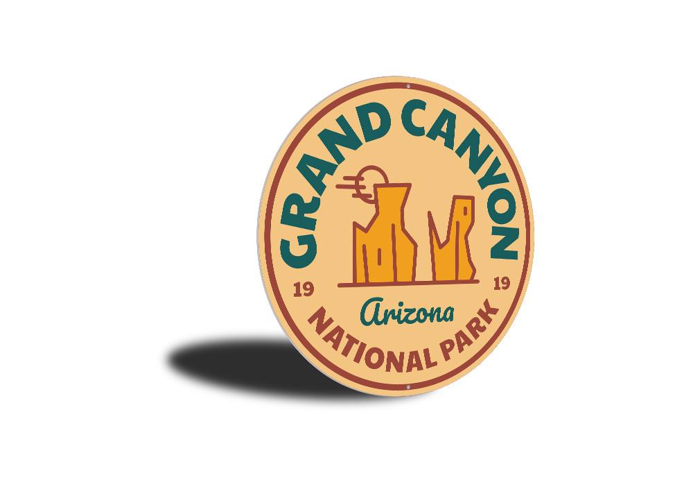 A decorative Grand Canyon Travel Sign made of aluminum, featuring vibrant colors and a scenic design, perfect for home decor.