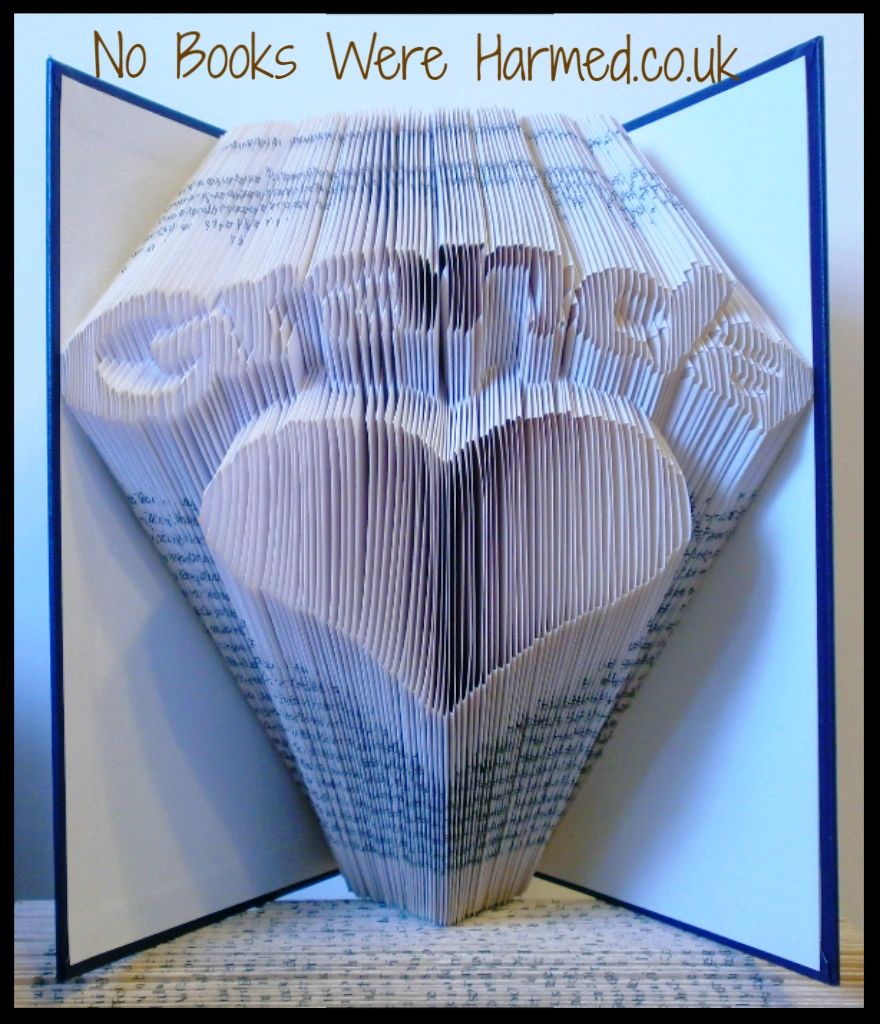 Handcrafted 'Granda' over love heart art made from vintage book pages, showcasing unique folds and textures.